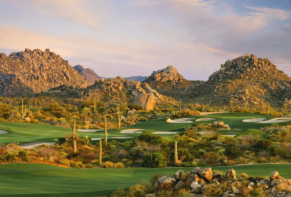 Boulder formations and desert fairways at Troon North Golf Club