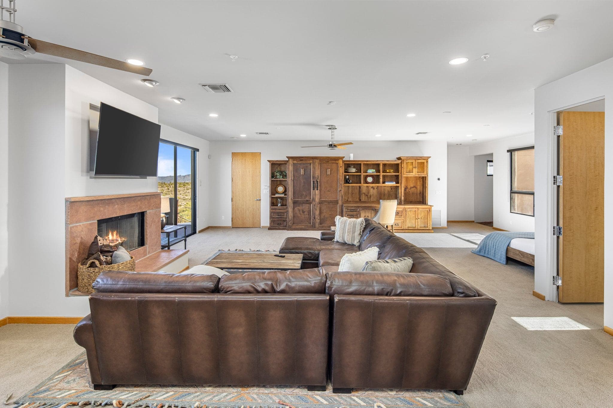 The Casita Great Room with fireplace and kitchenette, a self-contained breakout space